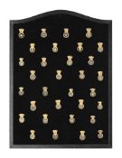 A COLLECTION OF THIRTY-TWO ENGLISH GILT BRASS POCKET WATCH BACK COCKS