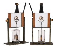 AN UNUSUAL PAIR OF LABORATORY CLOCK ESCAPEMENT DEMONSTRATION MODELS