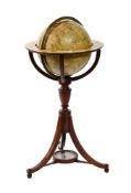 AN EARLY VICTORIAN TWELVE-INCH TERRESTRIAL FLOOR-STANDING LIBRARY GLOBE
