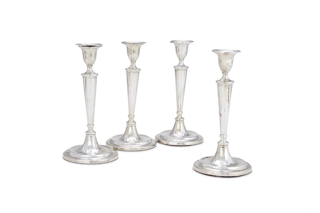 A SET OF FOUR GEORGE III SILVER CANDLESTICKS - Image 1 of 2