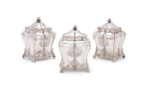 A SET OF THREE GEORGE III SILVER TEA CADDIES