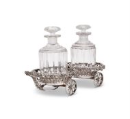 AN ELECTRO-PLATED DECANTER CARRIAGE