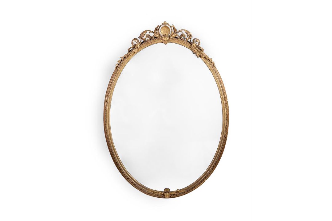 A LARGE CARVED GILTWOOD OVAL MIRROR, 19TH CENTURY - Image 1 of 4