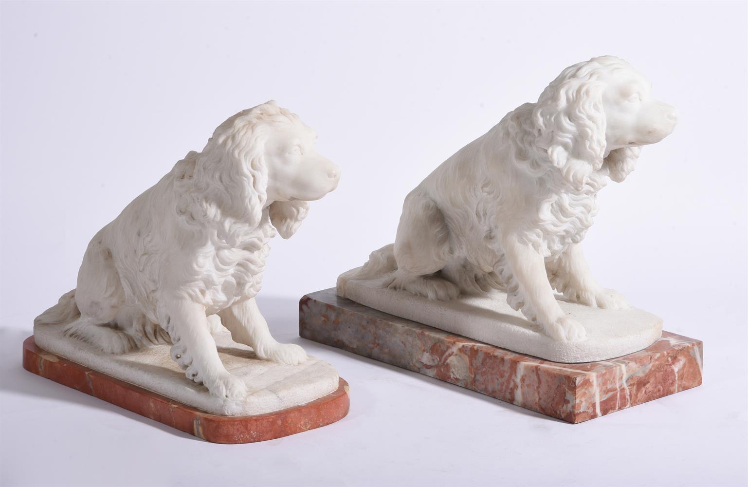 TWO SIMILAR CARVED ALABASTER MODELS OF SPANIELS EACH MOUNTED ON A PINK MARBLE BASE - Image 2 of 3