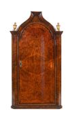A GEORGE I MULBERRY AND WALNUT HANGING CORNER CUPBOARD, CIRCA 1720