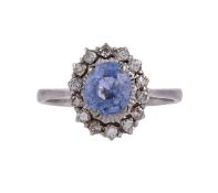A 1960S SAPPHIRE AND DIAMOND CLUSTER RING