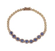 A SAPPHIRE AND DIAMOND CLUSTER BRACELET