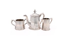 Y A VICTORIAN SILVER TAPERING OCTAGONAL TEA POT AND CREAM JUG
