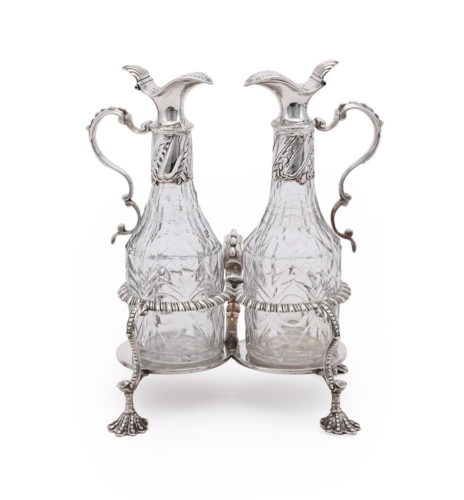 A GEORGE III SILVER OIL AND VINEGAR CRUET STAND