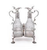 A GEORGE III SILVER OIL AND VINEGAR CRUET STAND