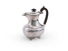 AN EDWARDIAN SILVER OBLONG BALUSTER COFFEE POT