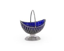 A GEORGE III SILVER OVAL SWING HANDLED SUGAR BASKET