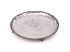 A SILVER CIRCULAR SALVER