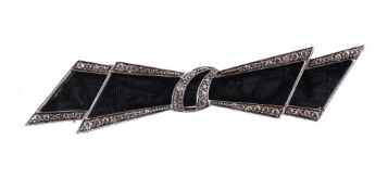 AN ART DECO DIAMOND AND BLACK RIBBON BROOCH, CIRCA 1920