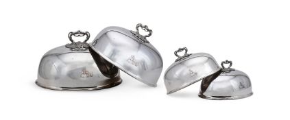 A SET OF FOUR ELECTRO-PLATED OVAL DOMED MEAT DISH COVERS
