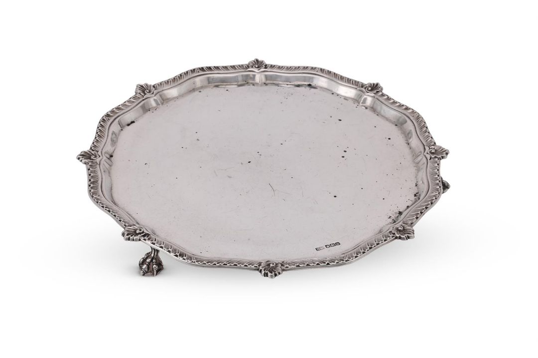 A SILVER SHAPED CIRCULAR SALVER - Image 1 of 3