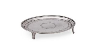 A GEORGE III SILVER OVAL TEAPOT STAND