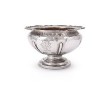 AN EDWARDIAN SILVER SHAPED CIRCULAR PEDESTAL BOWL