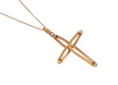 A CROSS PENDANT ON CHAIN