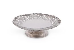 A SILVER CIRCULAR PIERCED PEDESTAL DISH