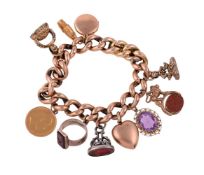 A VINTAGE CHARM BRACELET