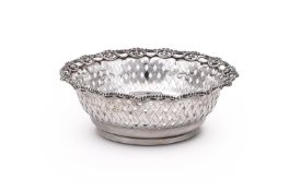 A SILVER SHAPED CIRCULAR BASKET