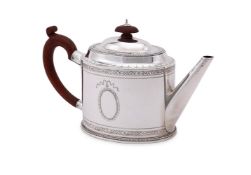 A SILVER OVAL TEA POT