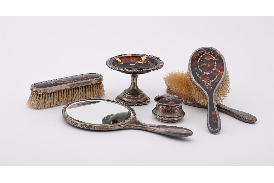 Y A SILVER MOUNTED AND TORTOISESHELL FOUR PIECE DRESSING TABLE SET