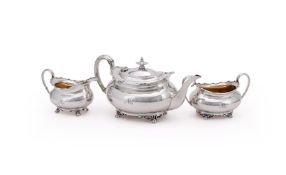 Y A SILVER THREE PIECE OVAL BALUSTER TEA SET