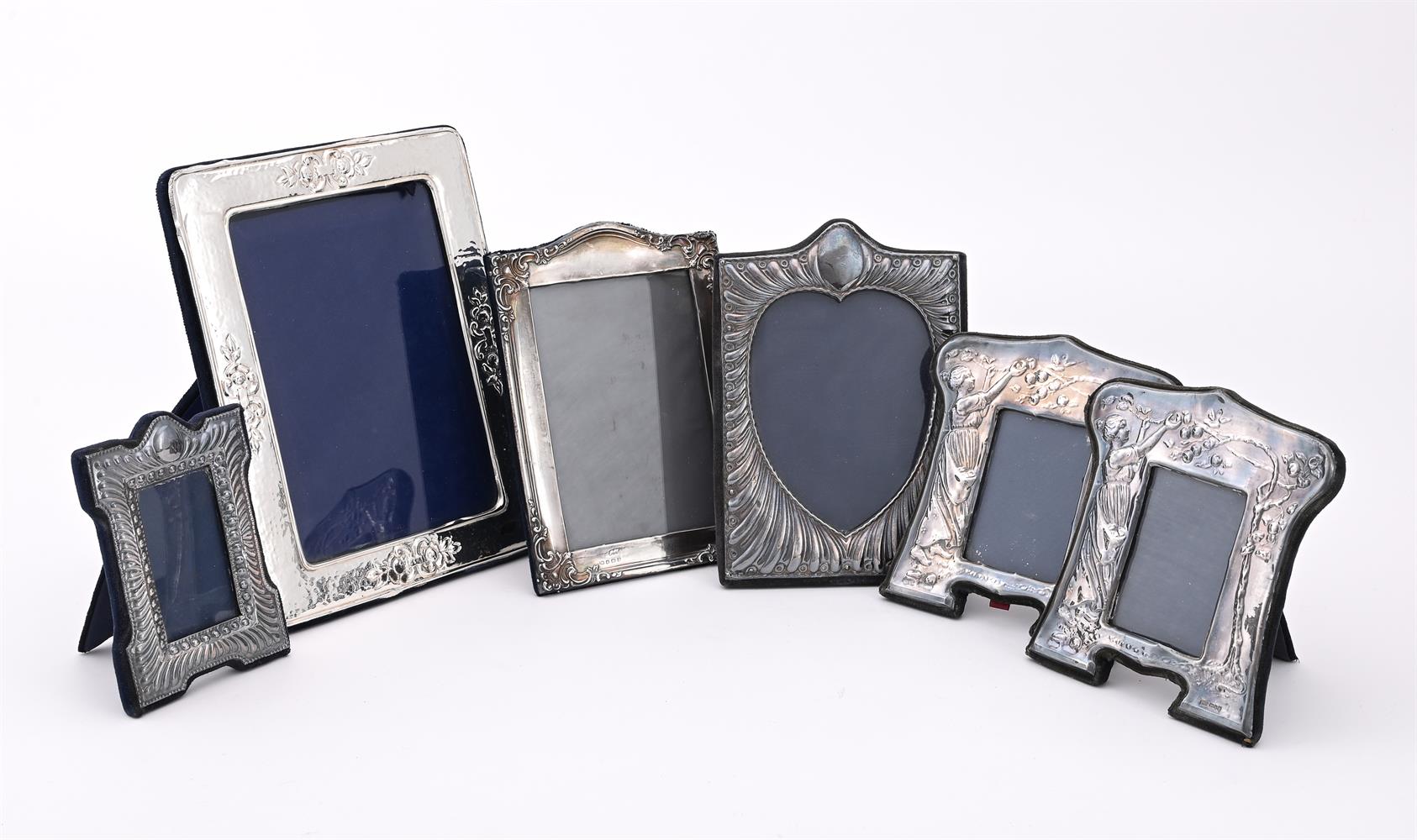 A COLLECTION OF SILVER MOUNTED PHOTO FRAMES