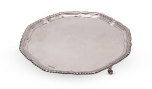A SILVER SHAPED CIRCULAR SALVER