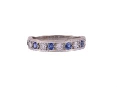 A SAPPHIRE AND DIAMOND HALF ETERNITY RING, LONDON 1988