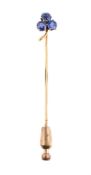 A SAPPHIRE CLOVER SHAPED STICK PIN