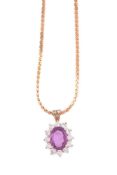 A PINK SAPPHIRE AND DIAMOND CLUSTER PENDANT