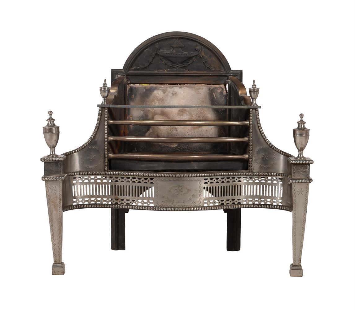 A STEEL FIRE GRATE IN GEORGE III 'ADAM' STYLE