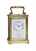 A FRENCH GILT BRASS REPEATING CARRIAGE CLOCK