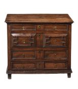 A CHARLES II OAK CHEST OF DRAWERS