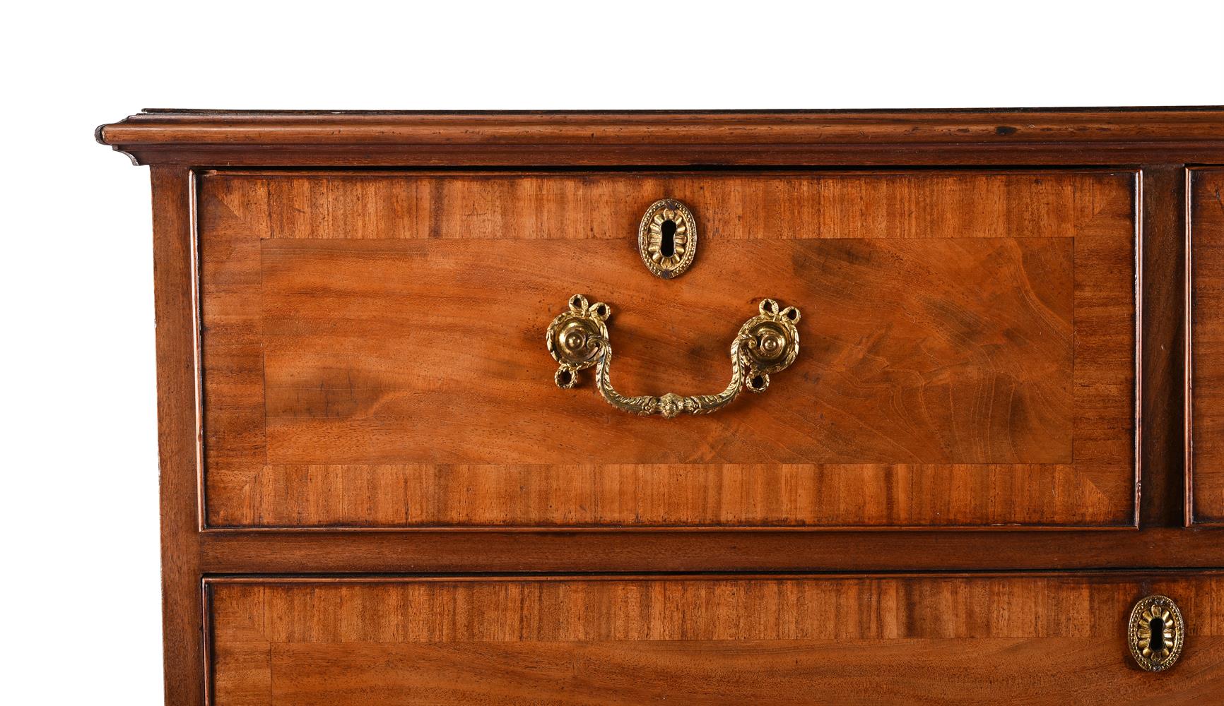 A GEORGE III MAHOGANY AND CROSSBANDED CHEST OF DRAWERS IN THE MANNER OF THOMAS CHIPPENDALE - Image 2 of 3