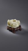 A pale celadon jade 'boys' water pot
