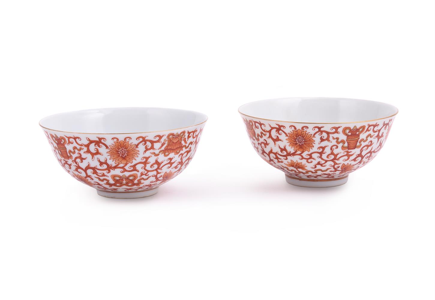A pair of Chinese iron red glazed bowls