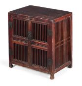 A small Chinese wood openwork cabinet
