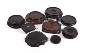 A group of Chinese and Japanese wood stands