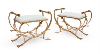 A PAIR OF SPANISH GILT METAL AND LINEN UPHOLSTERED STOOLS, MID 20TH CENTURY