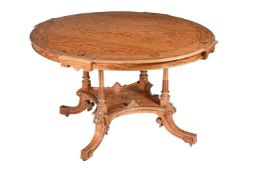 A VICTORIAN SATIN BIRCH CENTRE TABLE
