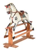 A DAPPLED GREY ROCKING HORSE