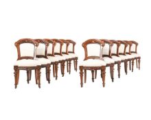 A SET OF TWELVE VICTORIAN STAINED OAK SIDE CHAIRS