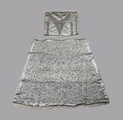 TWO LENGTHS OF SATIN EMBROIDERED WITH SILVER-FOIL APPLIQUE