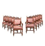 A SET OF TEN EDWARDIAN CARVED WALNUT DINING CHAIRS