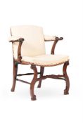 A GEORGE III MAHOGANY OPEN ARMCHAIR, IN THE MANNER OF THOMAS CHIPPENDALE, LATE 18TH CENTURY