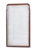 A GEORGE I WALNUT AND PARCEL GILT MIRROR, CIRCA 1720